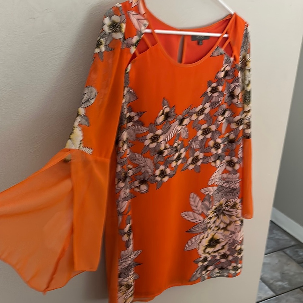 Orange and white urban outfitters shorter dress/long top. Perfect for game day!